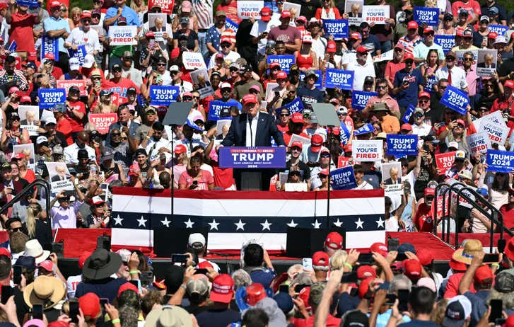 TOPSHOT - Former US President and Republican presidential candidate Donald Trump speaks during a campaign rally at the Historic Greenbrier Farms in Chesapeake, Virginia, on July 28, 2024. (Photo by Jim WATSON / AFP) (Photo by JIM WATSON/AFP via Getty Images) ORG XMIT: 776164242 ORIG FILE ID: 2159049436