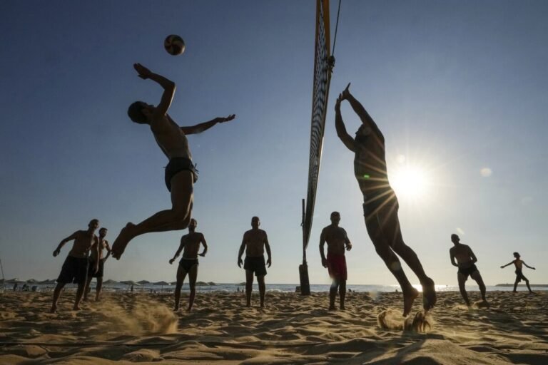 July 16, 2024 | Men play beach volley ball on a sweltering hot day at a public beach in Beirut.