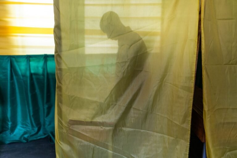 July 15, 2024 | A voter casts his ballot during general elections at a polling station in Kigali, Rwanda.