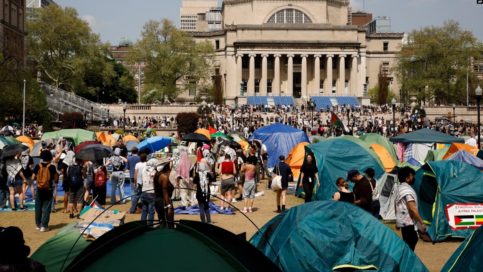 Student protesters gather inside their encampment on the Columbia University campus, on April 29, 2024, in New York