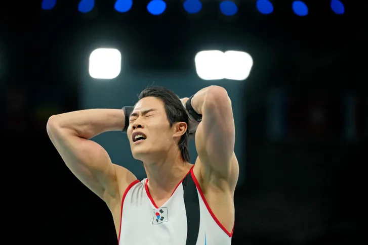 Woong Hur of Republic of Korea reacts after falling off the pommel horse on the first day of gymnastics event finals during the Paris 2024 Olympic Summer Games on Aug. 3, 2024 at Bercy Arena.