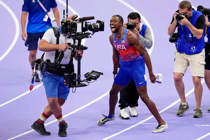 Noah Lyles (USA) celebrates after winning the men’s 100m final during the Paris 2024 Olympic Summer Games at Stade de France on Aug. 4, 2024.