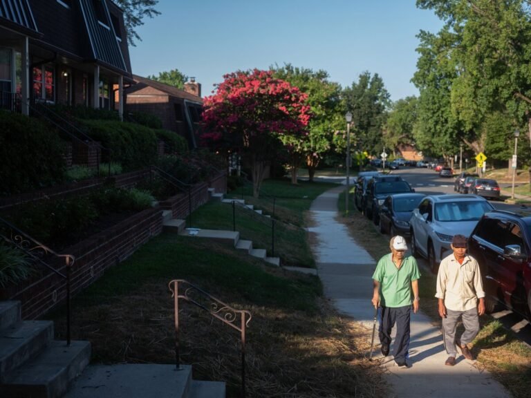 July 27, 2024 | Two residents take a stroll together in the Winter Hill neighborhood. Among all communities assessed in the Healthiest Communities rankings, Falls Church posted the highest walkability index score – a measure included in the infrastructure category – and rates among the nation’s best on a similar measure reflecting the share of its population living close to a destination like a library, museum or playground.